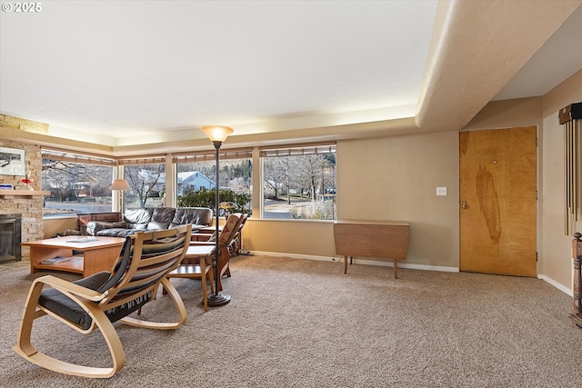 carpeted dining area featuring a fireplace