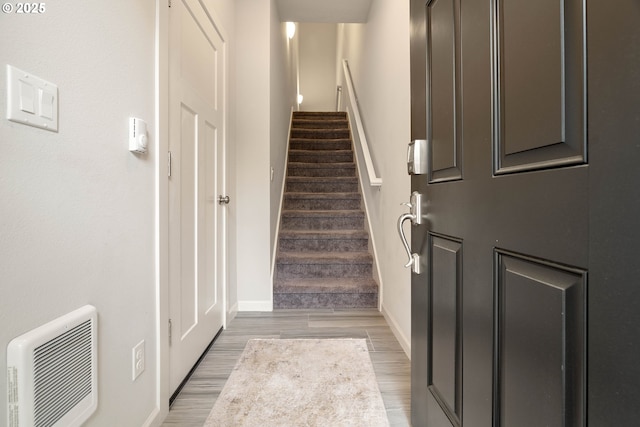 10420 SW Akilean Ter, Portland, OR 97223 - foyer entrance featuring stairway, light wood-style flooring, baseboards, and heating unit