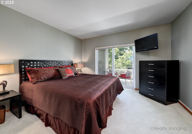 305 S Montgomery St Unit 404, Portland, OR 97201 - bedroom featuring light colored carpet, access to outside, and baseboards