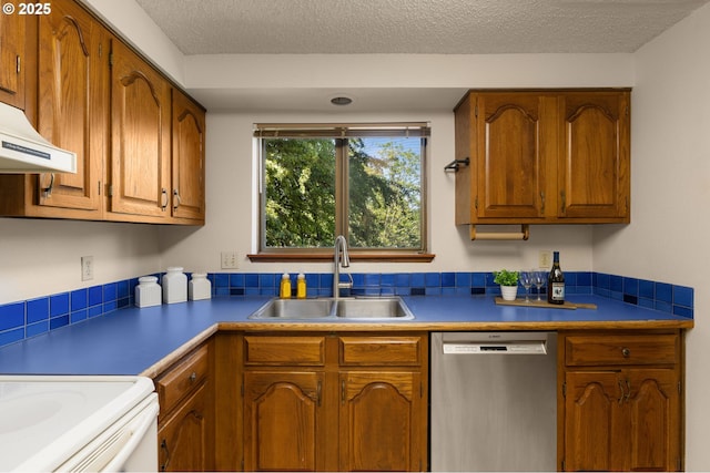 6416 SW 33rd Pl, Portland, OR 97239 - kitchen featuring dishwasher, brown cabinetry, a textured ceiling, and under cabinet range hood
