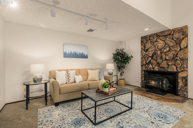 6416 SW 33rd Pl, Portland, OR 97239 - living area featuring carpet flooring, a textured ceiling, and rail lighting