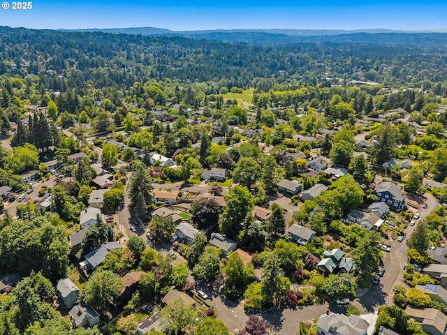 6416 SW 33rd Pl, Portland, OR 97239 - aerial perspective of suburban area with a heavily wooded area
