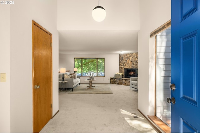 6416 SW 33rd Pl, Portland, OR 97239 - foyer with carpet and a stone fireplace