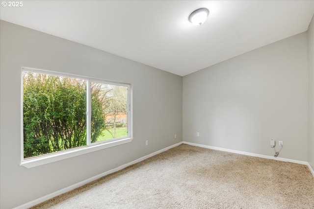 empty room with baseboards