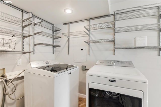 washroom featuring independent washer and dryer, laundry area, and electric panel
