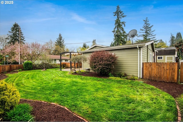 view of yard with fence
