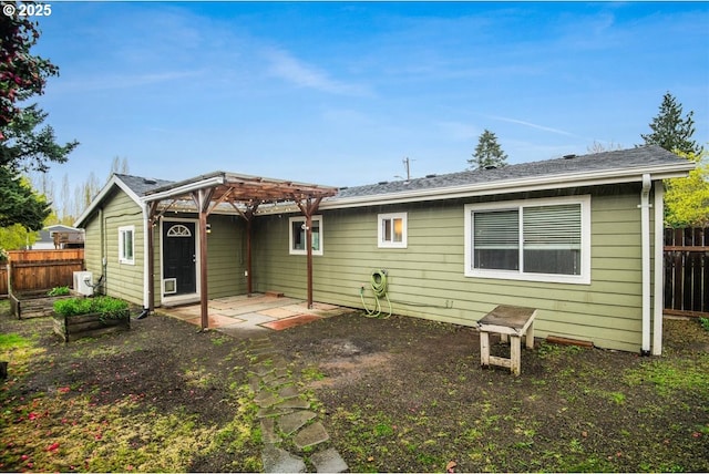 back of house featuring a patio area, ac unit, fence, and a pergola