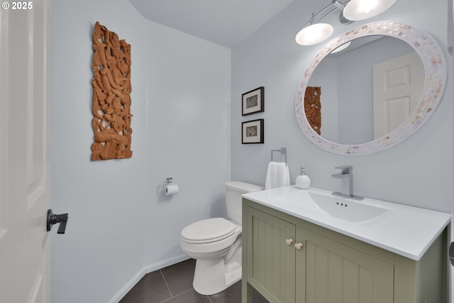 88005 Windleaf Way, Florence, OR 97439 - half bath with vanity, toilet, tile patterned flooring, and baseboards