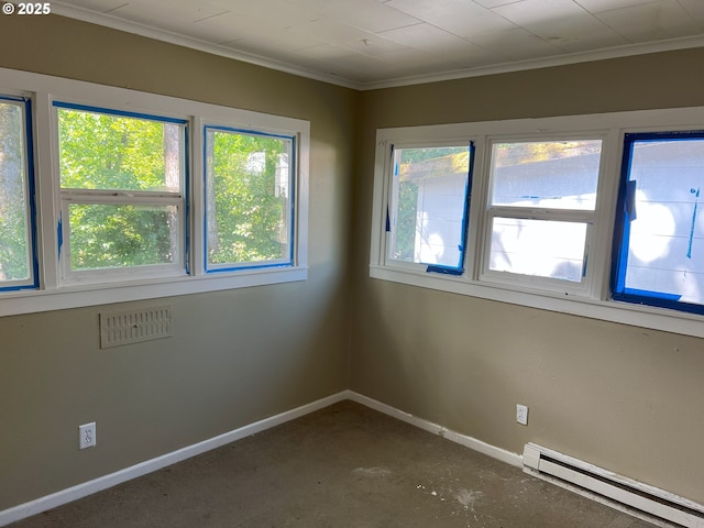 76464 High St, Oakridge, OR 97463 - empty room featuring a baseboard radiator, baseboards, ornamental molding, and dark carpet