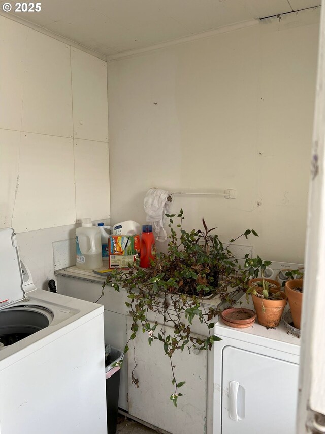 76464 High St, Oakridge, OR 97463 - washroom featuring washer / clothes dryer and crown molding