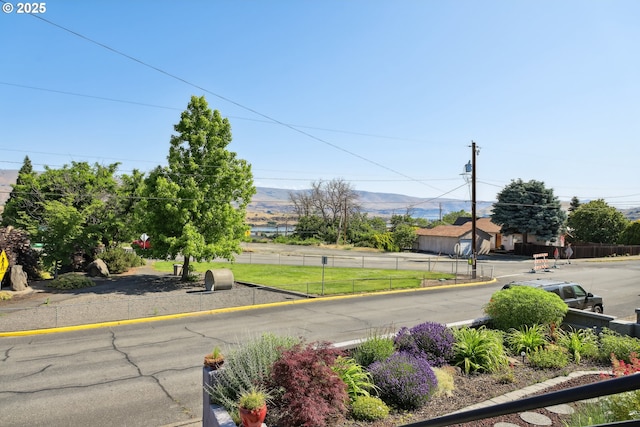1900 E 10th St, The Dalles, OR 97058 - view of asphalt road featuring curbs and a mountain view