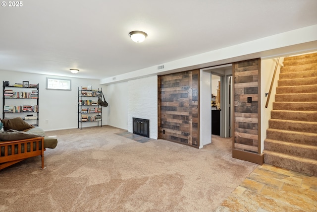 1900 E 10th St, The Dalles, OR 97058 - living area with stairs, a fireplace, and carpet floors