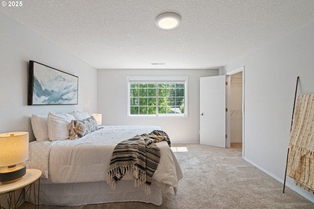 1608 NE 154th St, Vancouver, WA 98686 - carpeted bedroom featuring a textured ceiling and baseboards