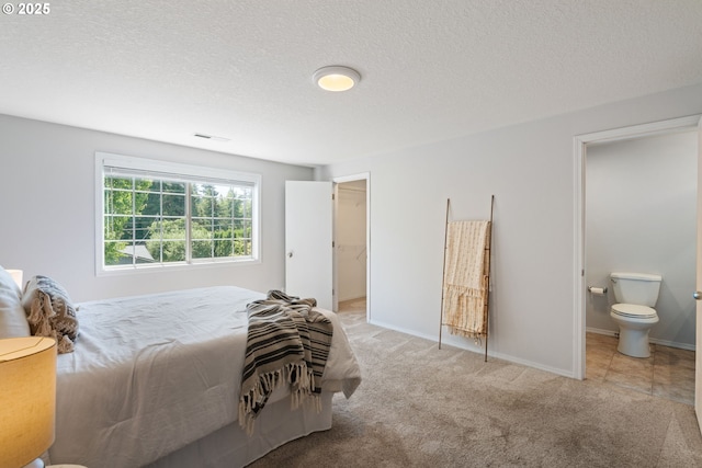 1608 NE 154th St, Vancouver, WA 98686 - bedroom with carpet floors, a textured ceiling, baseboards, and ensuite bathroom