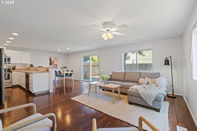 1608 NE 154th St, Vancouver, WA 98686 - living room featuring ceiling fan, recessed lighting, dark wood-style floors, and baseboards