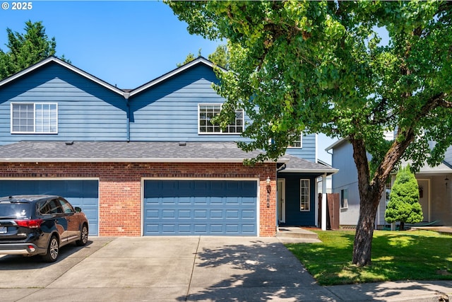 1608 NE 154th St, Vancouver, WA 98686 - view of front of property with driveway, an attached garage, brick siding, a front lawn, and roof with shingles