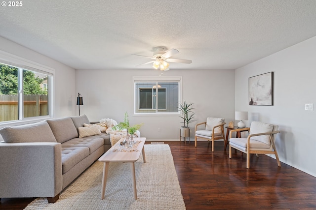 1608 NE 154th St, Vancouver, WA 98686 - living area featuring baseboards, wood finished floors, a ceiling fan, and a textured ceiling