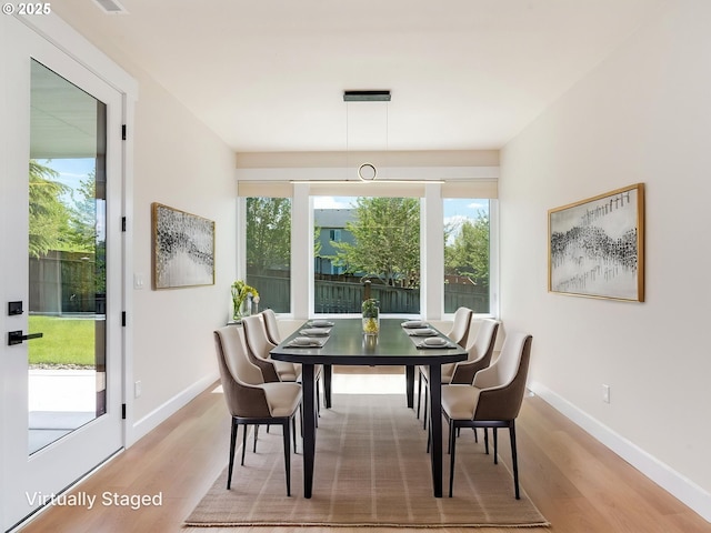 2650 NW Mt Ashland Dr, Mcminnville, OR 97128 - dining space with light wood finished floors and baseboards