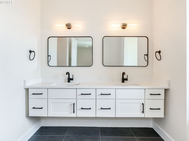2650 NW Mt Ashland Dr, Mcminnville, OR 97128 - full bathroom with baseboards, double vanity, and tile patterned flooring