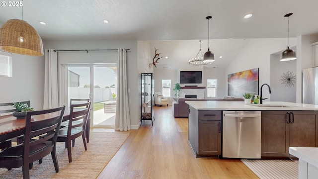 665 Browndell Ln, Stanfield, OR 97875 - kitchen featuring stainless steel dishwasher, a sink, light countertops, light wood finished floors, and recessed lighting