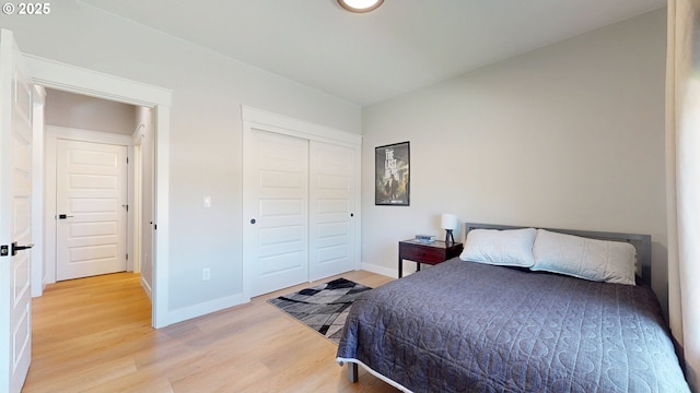 665 Browndell Ln, Stanfield, OR 97875 - bedroom featuring light wood-style flooring, baseboards, and a closet