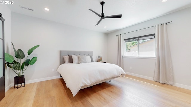 665 Browndell Ln, Stanfield, OR 97875 - bedroom with light wood-type flooring, baseboards, recessed lighting, and a ceiling fan
