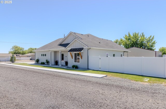 665 Browndell Ln, Stanfield, OR 97875 - modern farmhouse style home featuring board and batten siding and a shingled roof