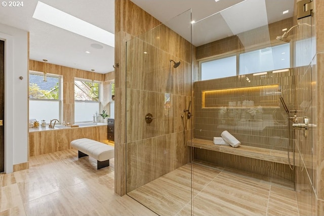 bathroom featuring tile patterned floors, vanity, and separate shower and tub