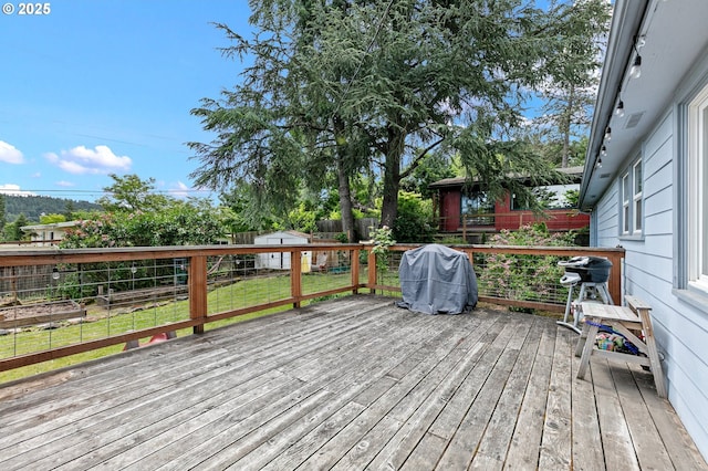 3505 Donald St, Eugene, OR 97405 - wooden deck featuring an outdoor structure