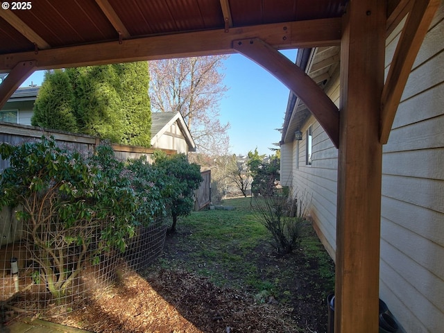 view of yard featuring fence