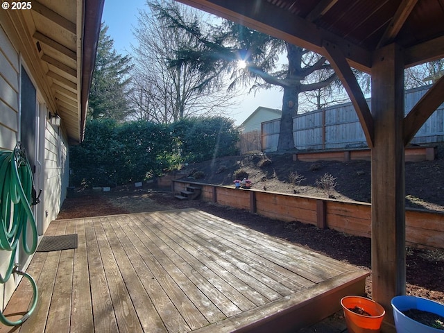 wooden deck featuring fence