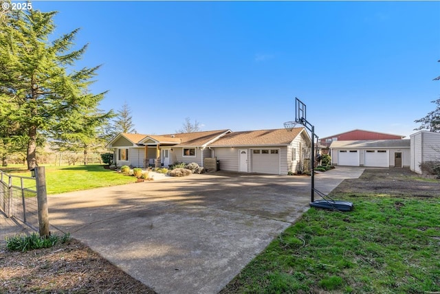 ranch-style home with a garage, a front yard, and fence