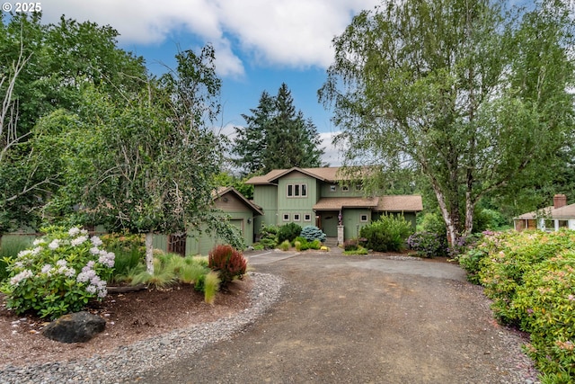 390 Singing Waters Rd, Winchester, OR 97495 - view of front of property featuring driveway and board and batten siding