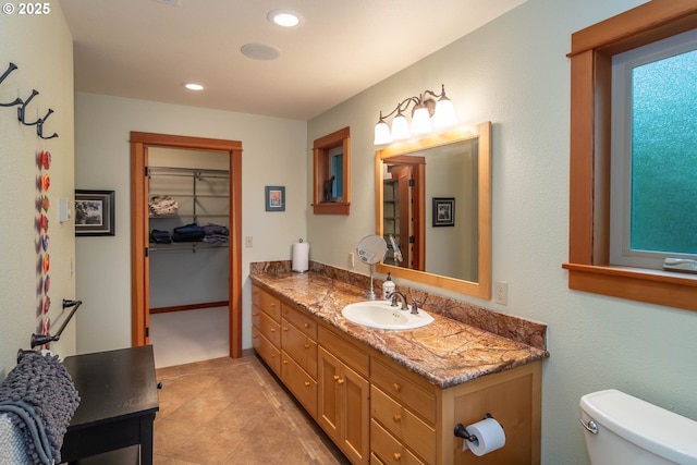390 Singing Waters Rd, Winchester, OR 97495 - bathroom with vanity, toilet, and recessed lighting