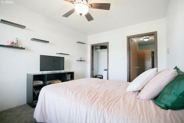 bedroom with a closet, a ceiling fan, and carpet