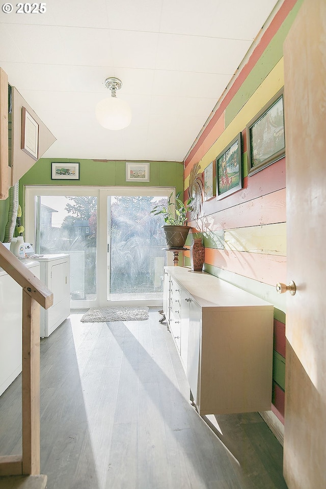 hallway featuring washer and clothes dryer