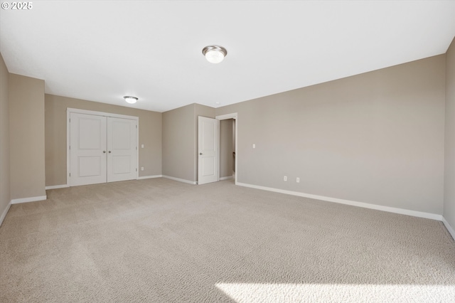 interior space with carpet floors and a closet