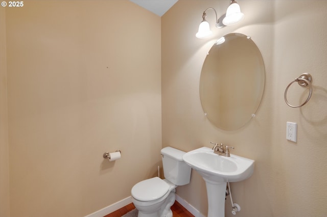 bathroom featuring toilet