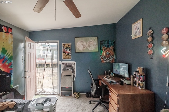 office featuring a ceiling fan and carpet