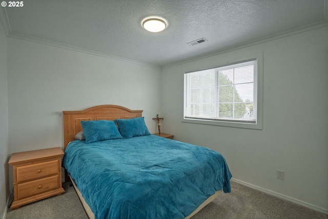 carpeted bedroom with crown molding, a textured ceiling, visible vents, and baseboards