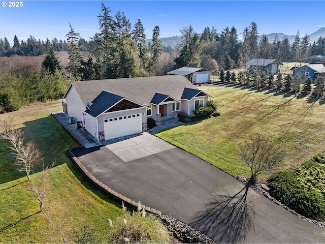 birds eye view of property featuring a mountain view