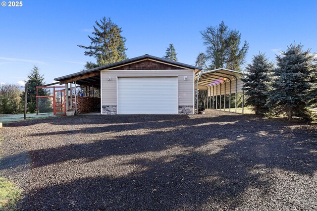 garage featuring a carport