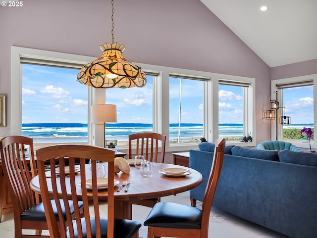 3764 Pacific Ave, Cannon Beach, OR 97110 - dining area featuring a water view, recessed lighting, and high vaulted ceiling