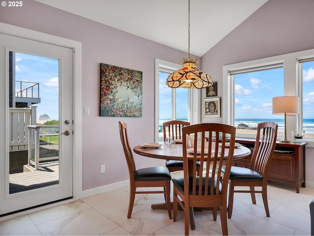 3764 Pacific Ave, Cannon Beach, OR 97110 - dining room featuring healthy amount of natural light and lofted ceiling
