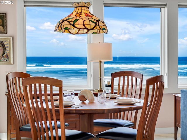 3764 Pacific Ave, Cannon Beach, OR 97110 - dining room with a water view and plenty of natural light