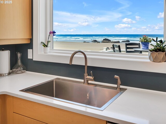 3764 Pacific Ave, Cannon Beach, OR 97110 - kitchen view of light brown cabinets, light countertops, and nearby water