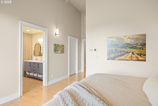800 Rosemont Rd, West Linn, OR 97068 - bedroom featuring high vaulted ceiling, light wood-type flooring, baseboards, and connected bathroom