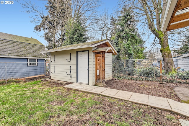 view of shed featuring a fenced backyard