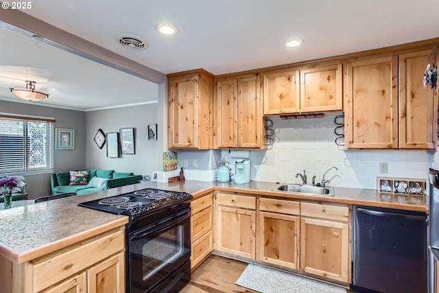 kitchen with visible vents, dishwashing machine, black range with electric cooktop, and light brown cabinetry