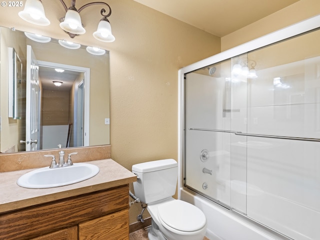 14300 Sherbrook Pl, Lake Oswego, OR 97035 - bathroom with vanity, toilet, and shower / bath combination with glass door